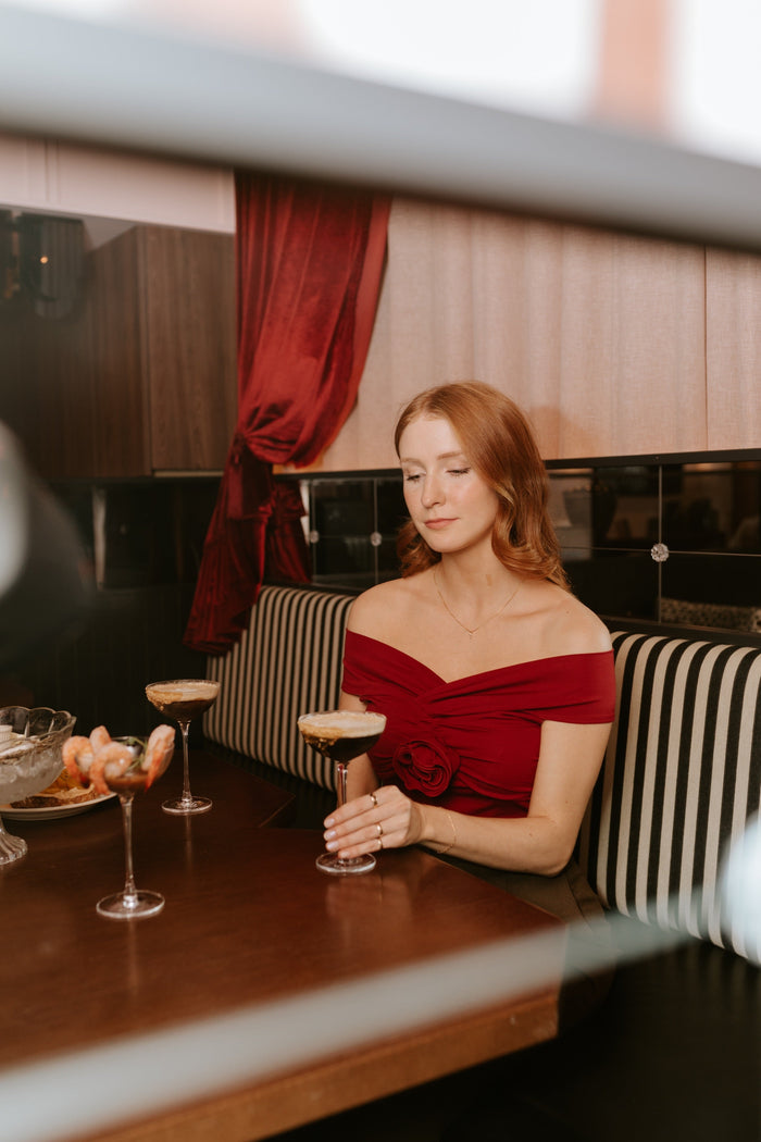 woman sitting in a restaurant