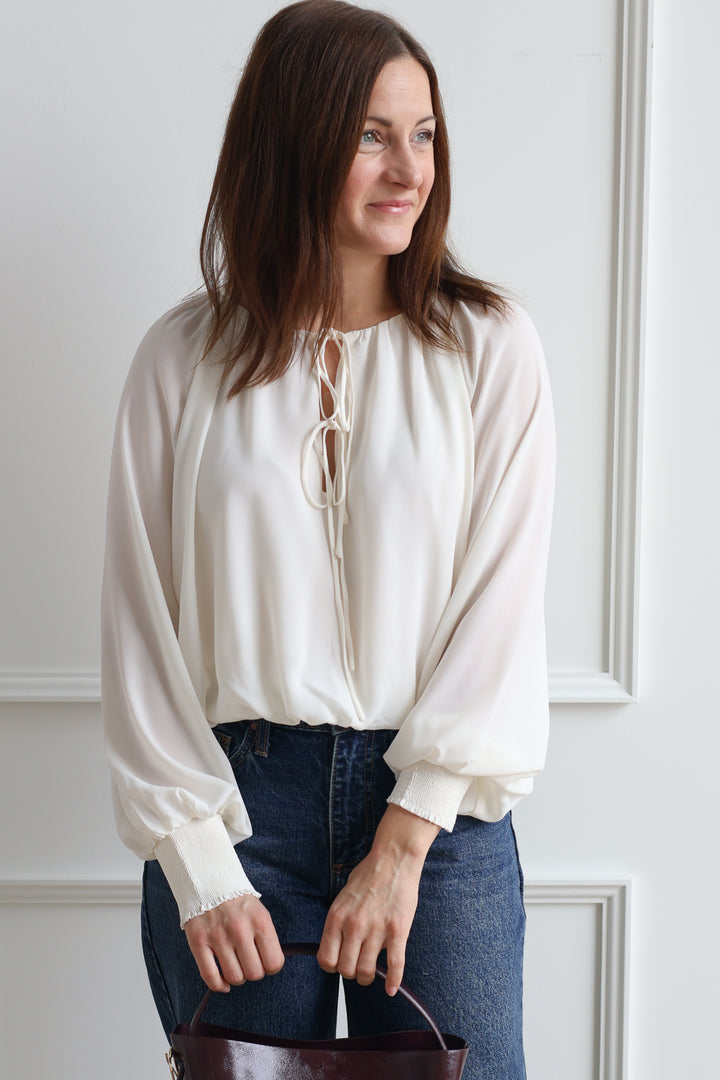 Butter Cream Bubble Hem Blouse